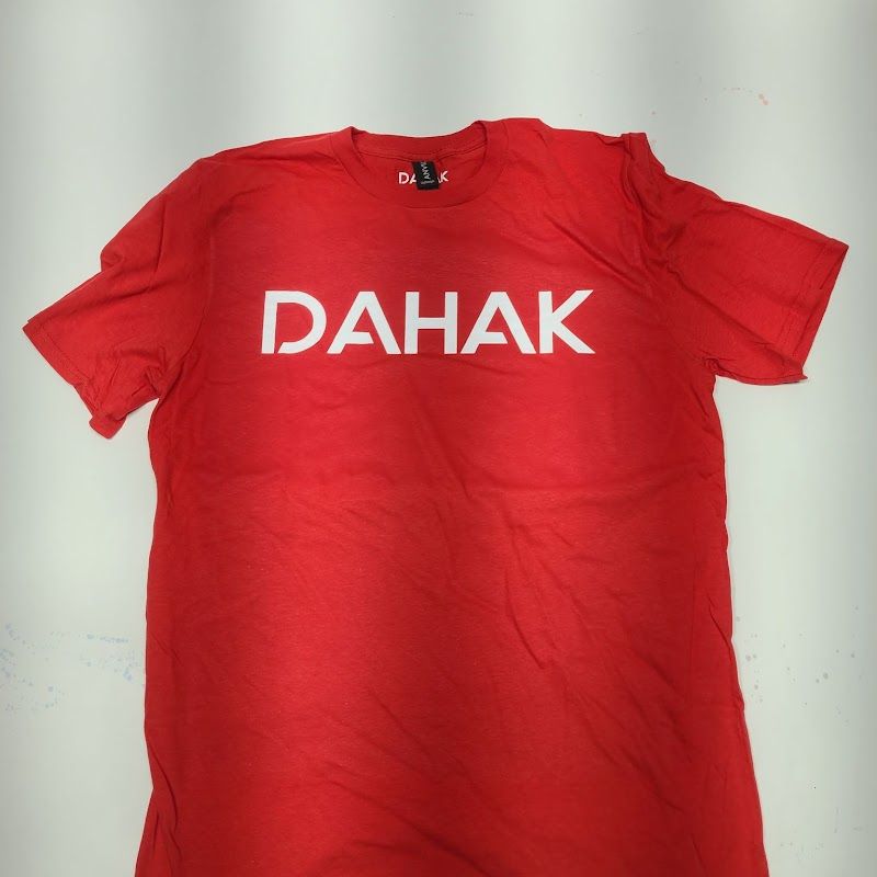 Red tee with white DAHAK lettering